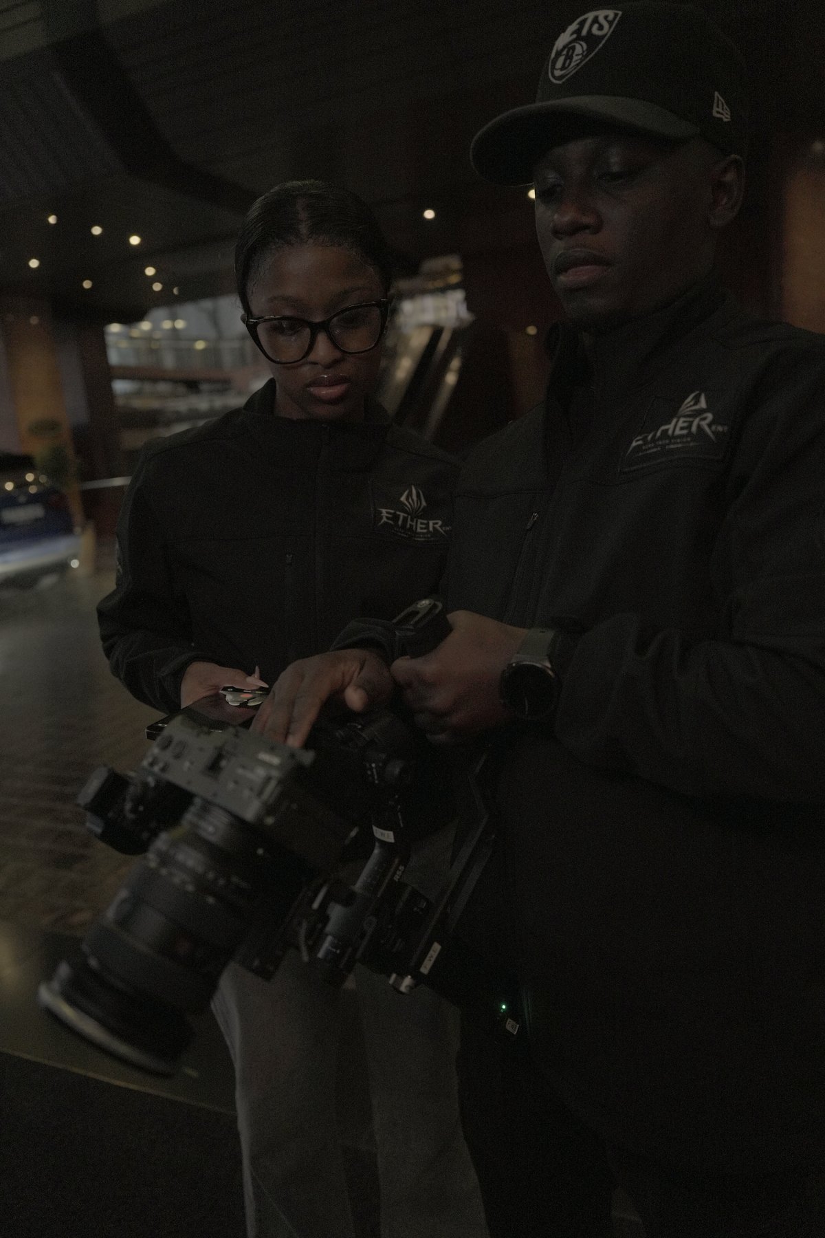 Ether Ent. crew at a live experience activation